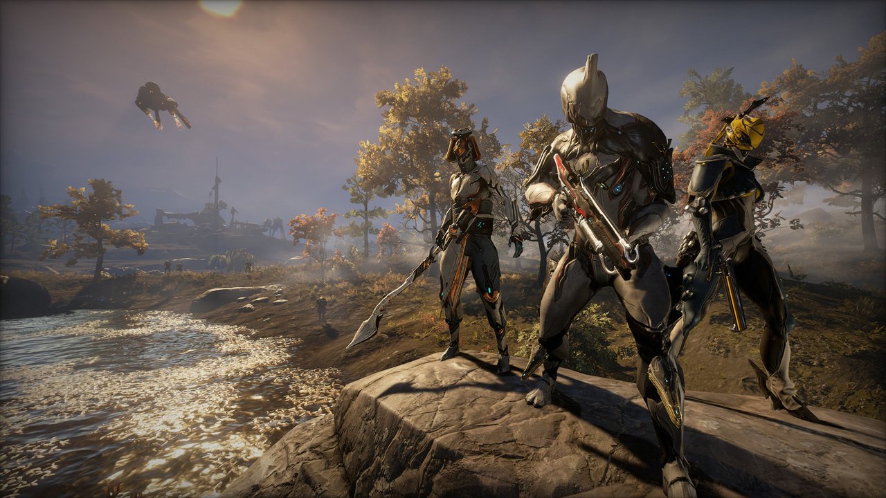 Warframes crossing a dusty plain